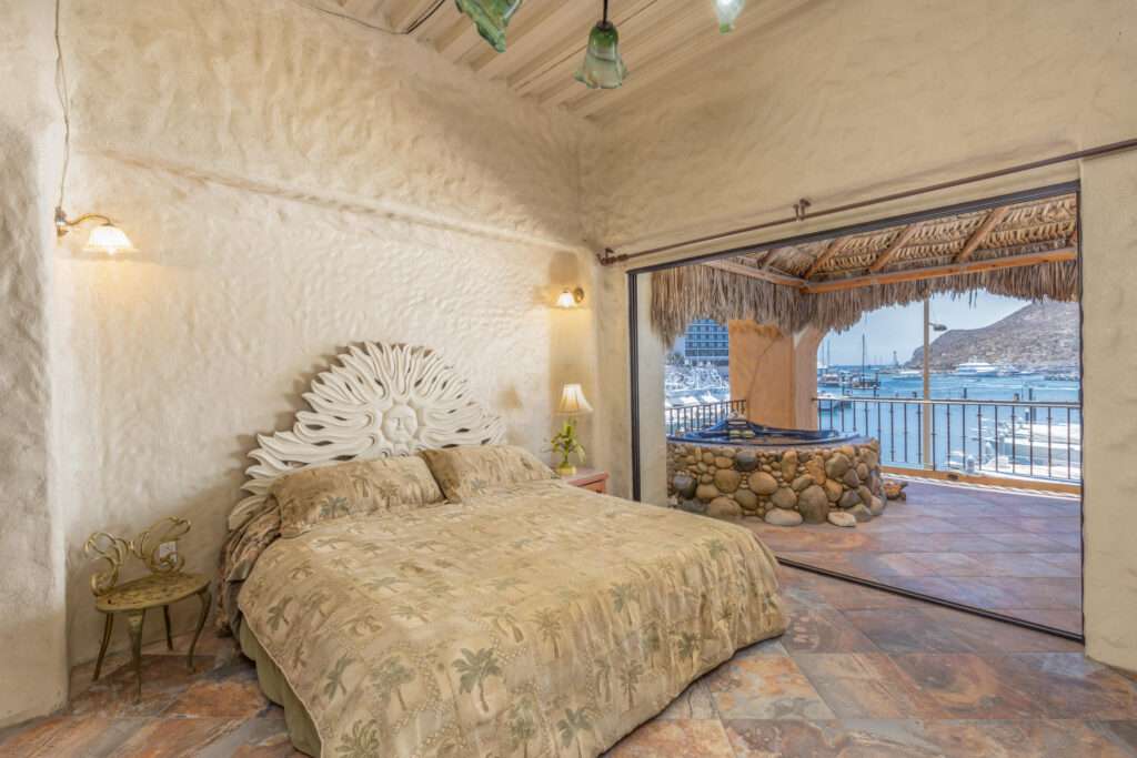 Los Cabos Tesoro Not all luxury condos are created equal. This extraordinary end-unit residence at Tesoro Resort stands apart as one of the most unique offerings in Cabo San Lucas.Boasting approximately 1,800 square feet of bright, open living space, this two-bedroom, two-bath condominium features an oversized primary suite, dedicated laundry area, and a spacious floor plan designed to capture the energy and beauty of the marina from nearly every angle.The true showpiece is the spectacular palapa-covered terrace--one of the largest private outdoor living spaces in the marina. Complete with a custom Jacuzzi, this incredible outdoor retreat functions as a second living room, dining area, and entertainment space all in one. From sunrise to sunset, enjoy commanding – calle sin nombre, Cabo San Lucas, BS