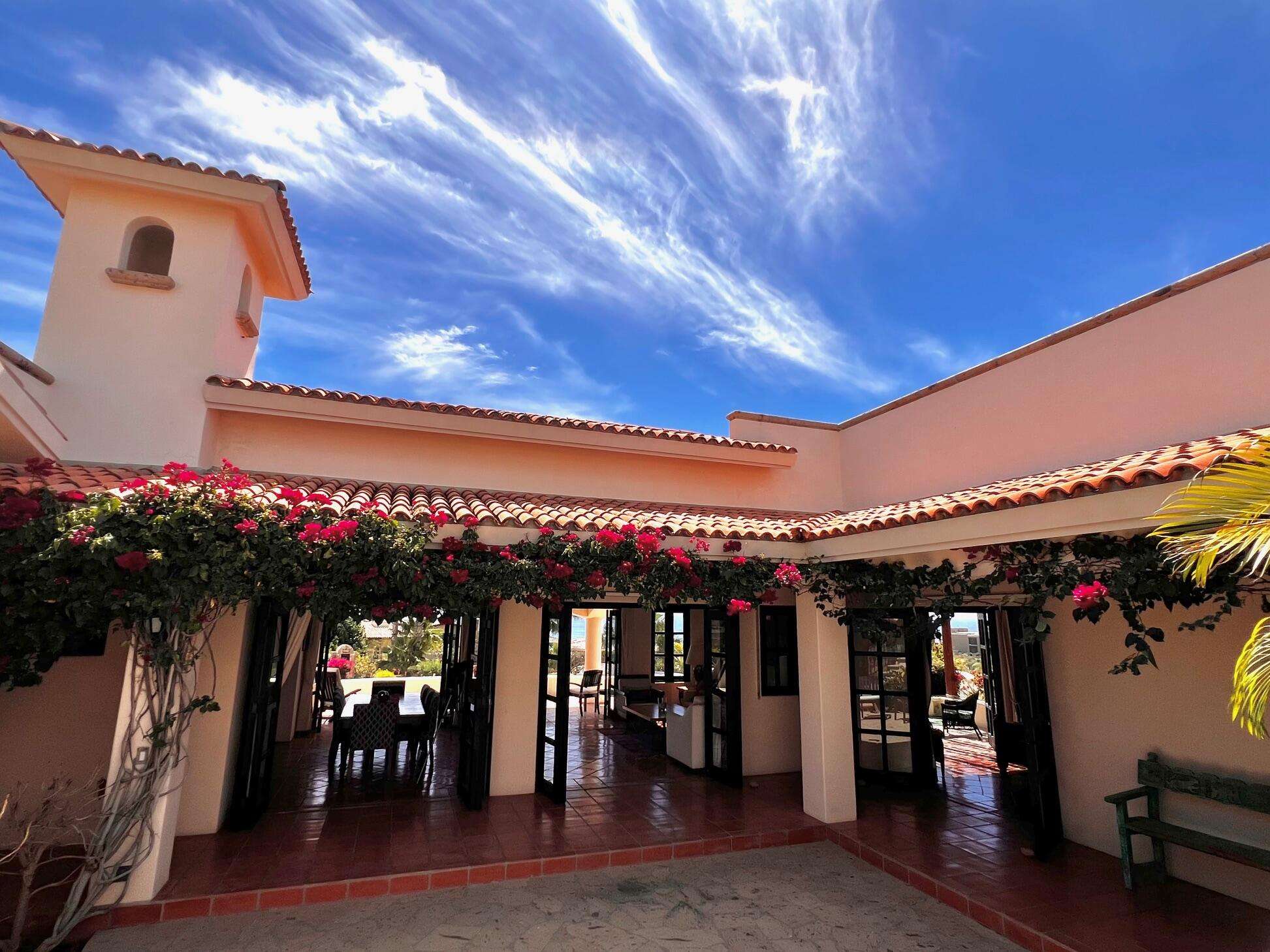 Los Cabos La Noria One of the first homes built in La Noria, within the amenity rich development of Puerto Los Cabos, this very unique two bedroom, two bath home, followed the Hacienda style's original design guidelines, with a large entry courtyard, rooms to the sides and opening to the main living area, kitchen and outdoor patio/deck.The initial concept and plans were designed with a third bedroom in mind, to be built at a different time, yet the functionality of the two bedroom house ended up suiting its owners well and thus house did not grow within the still remaining buildable area of the homesite.Subsequently, a second design concept was planned, to build a second level master bedroom with panoramic – Casa Doyle, San Jose del Cabo, San Jose del Cabo, BS