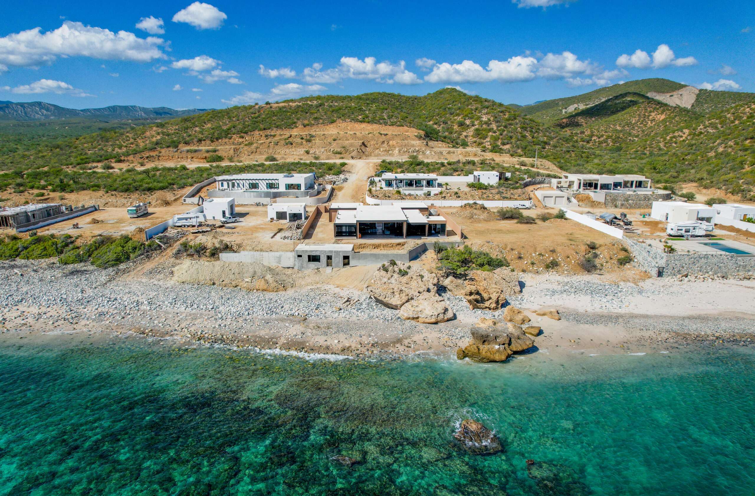 Los Cabos El Tule-Inland:General SAVVY INVESTOR'S DREAM -- BUILT WITH EXCEPTIONAL QUALITY & LIMITLESS POTENTIAL. A rare turnkey development opportunity distinguished by elite construction standards - a level of quality seldom found in Los Cabos. Offered as a complete 10-unit boutique project, it includes two fully finished, luxury turnkey residences showcasing the superior craftsmanship, premium materials, and structural durability that define this development. The remaining eight units are structurally prepared and ready to be completed according to the existing design or customized to match the buyer's vision. Blueprints are in early conceptual stage and can be modified to create a variety of high-value concepts, such as: Boutique hotel, Luxury branded residences, Wellness or medical retreat, Corporate retreat or co-living concept, Exclusive rental community.Located in the high-demand Corridor between Cabo San Lucas and San José del Cabo, the project benefits from exceptional visibility, strong rental demand, and for sale