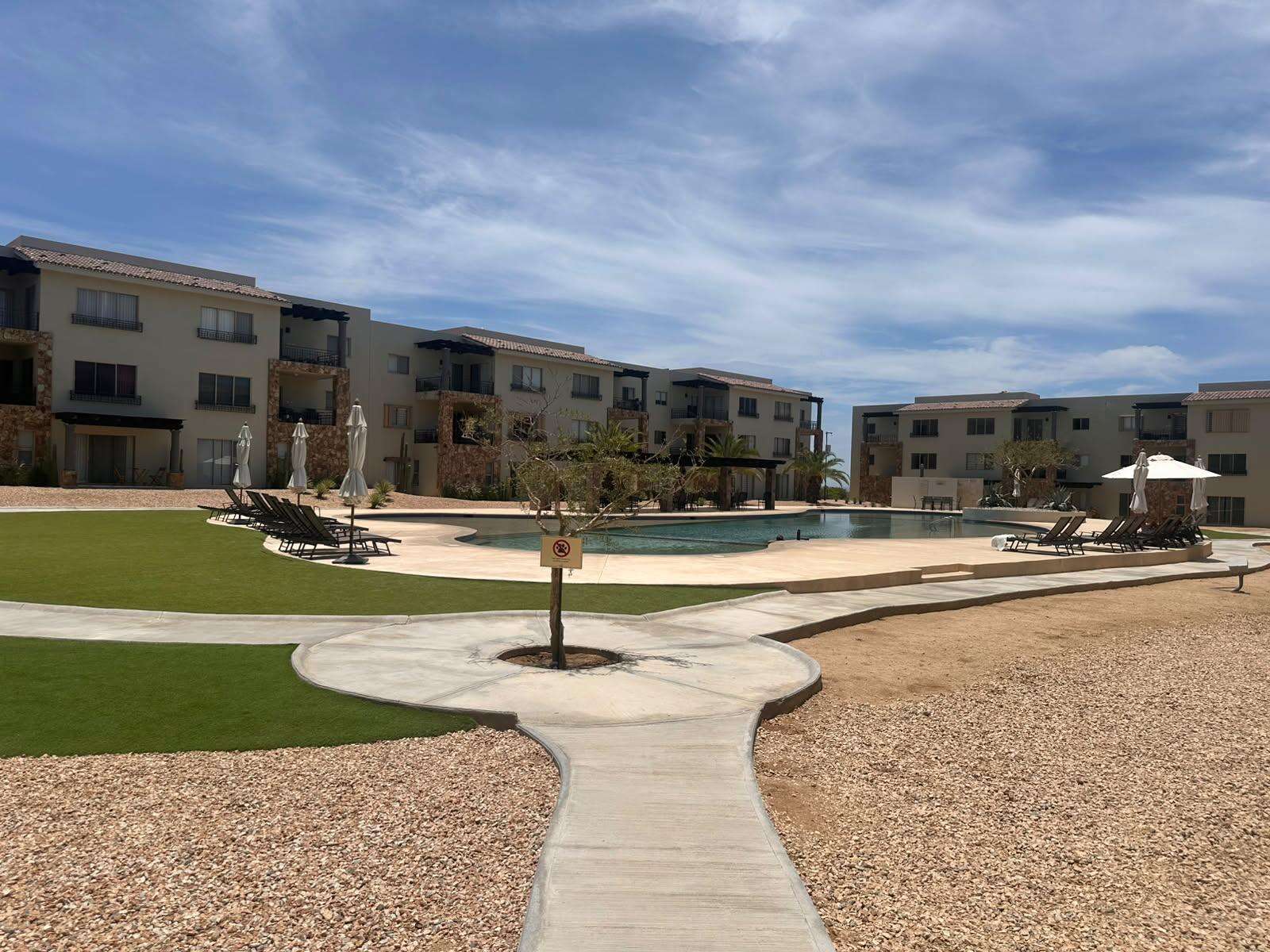 Los Cabos Camino Del Mar Ground-Floor Condo | La Joya at Camino del Mar, El TezalDiscover the perfect blend of comfort, convenience, and investment potential in this beautiful ground-floor condominium located in the highly sought-after La Joya Residences, within the master-planned community of Camino del Mar in El Tezal, one of Los Cabos' fastest-growing and highest-appreciating neighborhoods.This thoughtfully designed residence features:* 2 spaci ous bedrooms* 2 full bathrooms* TV / Family Room* Ground-floor location with direct access to the pool* Swimming pool right in front of your terraceResidents also enjoy exclusive resort-style amenities, including:✔️ Semi-Olympic swimming pool✔️ Fully equipped fitness center✔️ Kids' Park✔ for sale