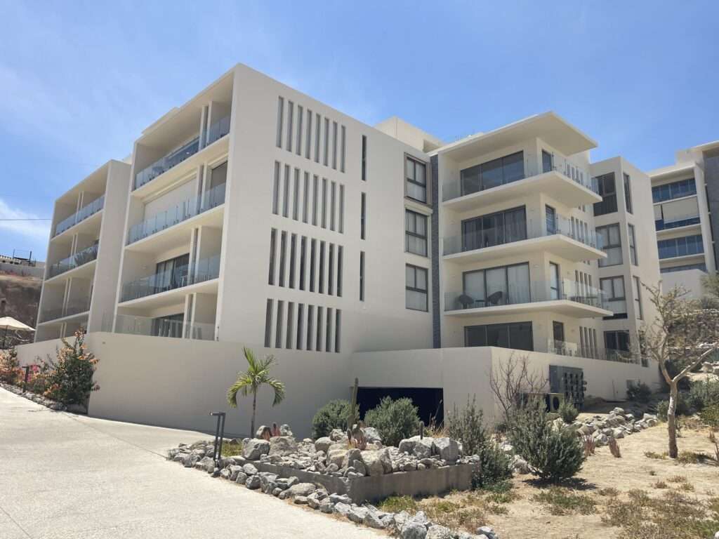 Los Cabos Cabo Costa POOL INCLUDED! This stunning 2-bedroom condo with huge deck is located on the first level in the Balandra Tower of Cabo Costa . Cabo Costa is the newest community that blends its arquitectural designs with nature. This unit has been meticulously designed and comprises two end-suite bedrooms. The property interior is designed in neutral tones to create a modern, welcoming and luxurious home yet retaining its original features. Amenities such as a Club House, Infinity pool, Gym, sundeck, Kids area, Jacuzzi, Wetbar, Snackbar & Massage area. – s/n, PANORAMA, Cabo Corridor, Cabo Corridor, BS