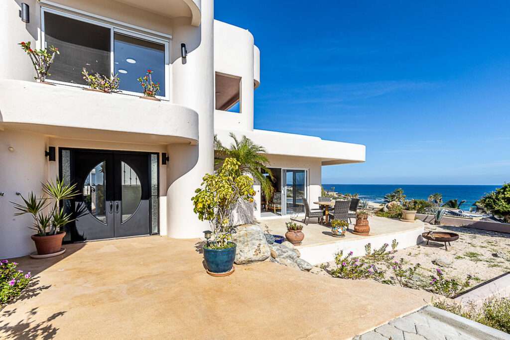 Los Cabos Blue Moon Located in the prestigious gated community of Pedregal, Villa De La Luz offers timeless Mexican Hacienda architecture combined with spacious living and exceptional comfort.This beautifully designed residence features expansive indoor and outdoor areas, ideal for both full-time living and entertaining. Bright interiors flow seamlessly to generous terraces, creating the perfect setting to enjoy Cabo's lifestyle.The home offers 6 en-suite bedrooms, a fully equipped kitchen, and thoughtfully designed living spaces. Outdoor amenities include a private swimming pool, jacuzzi, and BBQ area, providing an ideal environment for relaxation and gatherings.Include a two-car garage, ample storage, and access to Pedregal's exclusive amenities, including 24/7 security, beach and green areas. – 30 Cam. Grande, Cabo San Lucas, BS