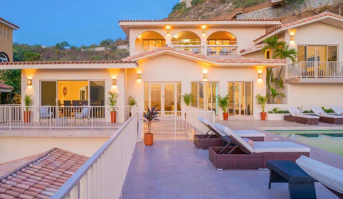 Los Cabos Los Valles Sophisticated and solidly built, this 5,588 sq.ft. estate in Club Campestre offers luxury living with exceptional construction quality rarely found in Los Cabos. Residents enjoy exclusive access to a private beach club and world-class golf course, all just minutes from San Jose vibrant dining and culture. The home features 4 ensuite bedrooms, a 3-stop elevator, and a Generac backup system. Entertain in style with a chef's kitchen, wine room with Tzalam wood cabinetry, and an outdoor BBQ area with fire pit. Relax by the heated pool or on the Jacuzzi terrace with partial ocean for sale