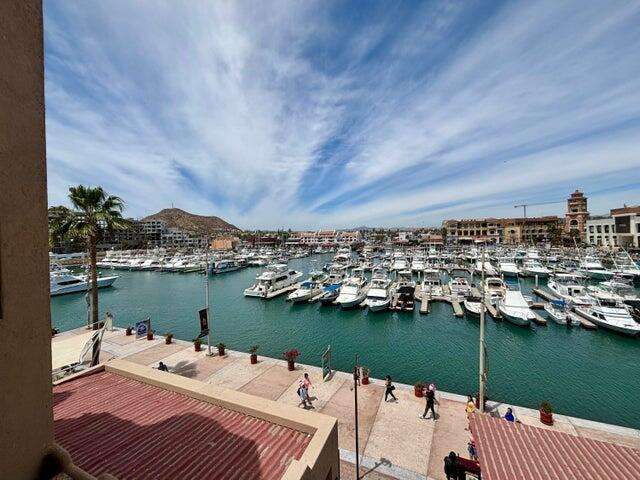 Los Cabos Vista Mare Condo for sale at Vista Mare, Cabo San Lucas, located on the fourth floor within a private residential community in the Sunset area. Its strategic location offers a peaceful setting just minutes from downtown, the Marina, restaurants, cafés, supermarkets, shopping, services, and entertainment. The unit offers 111.15 m² total, including 97.65 m² of air-conditioned interior space and a 13.5 m² private terrace. It features 2 bedrooms, 2 full bathrooms, an open living and dining area, equipped kitchen, A/C, and 1 underground parking space. Amenities include 2 pools, gym, jacuzzi, firepit, and social areas. Ready for delivery. Price: for sale