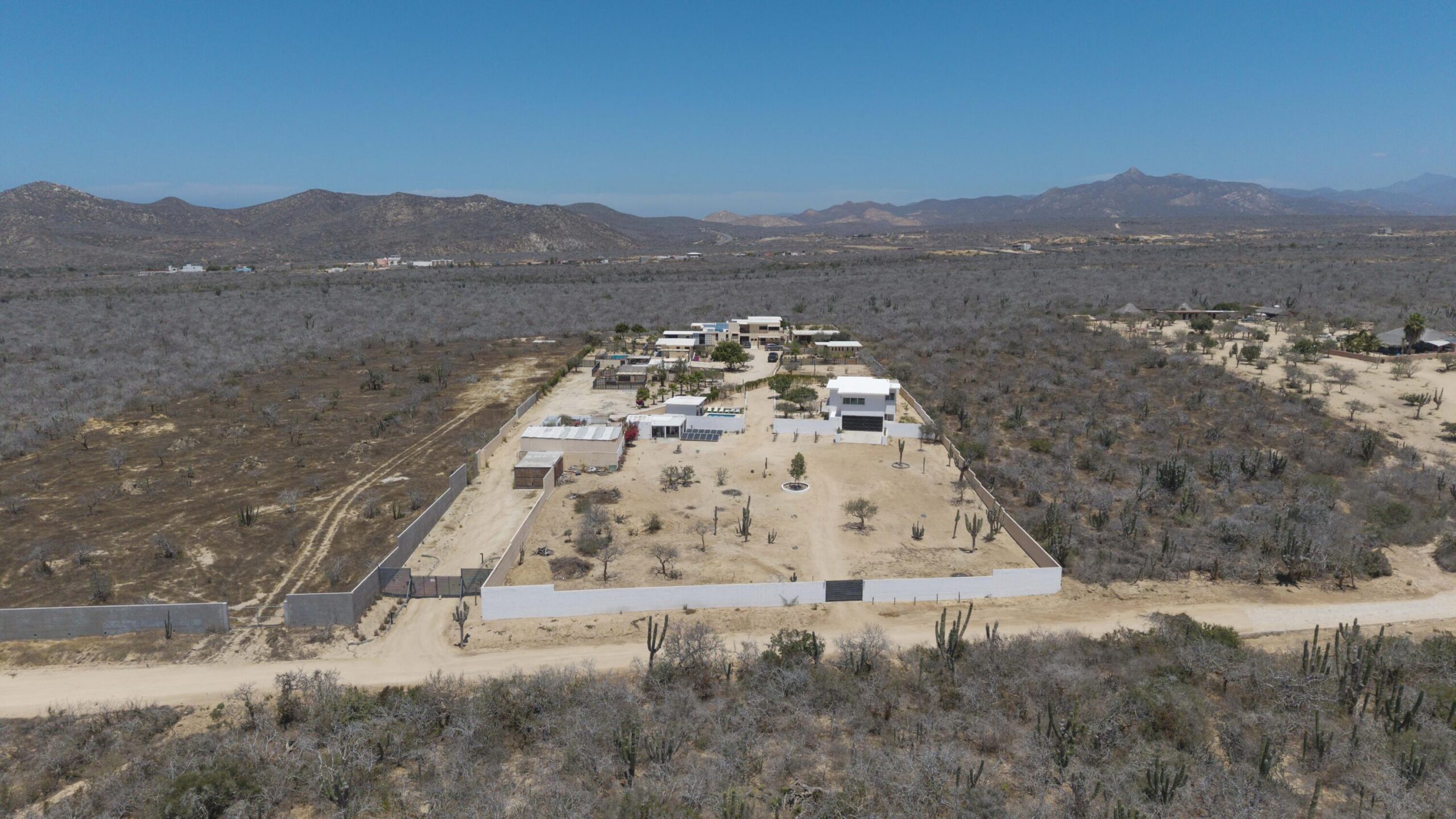 Los Cabos El Tule-Inland:General Rare investor opportunity in the San José Corridor. 2 luxury residences fully completed and move-in ready. 8 additional units with land secured and full blueprints in place -- ready to build to buyer's vision. At for sale