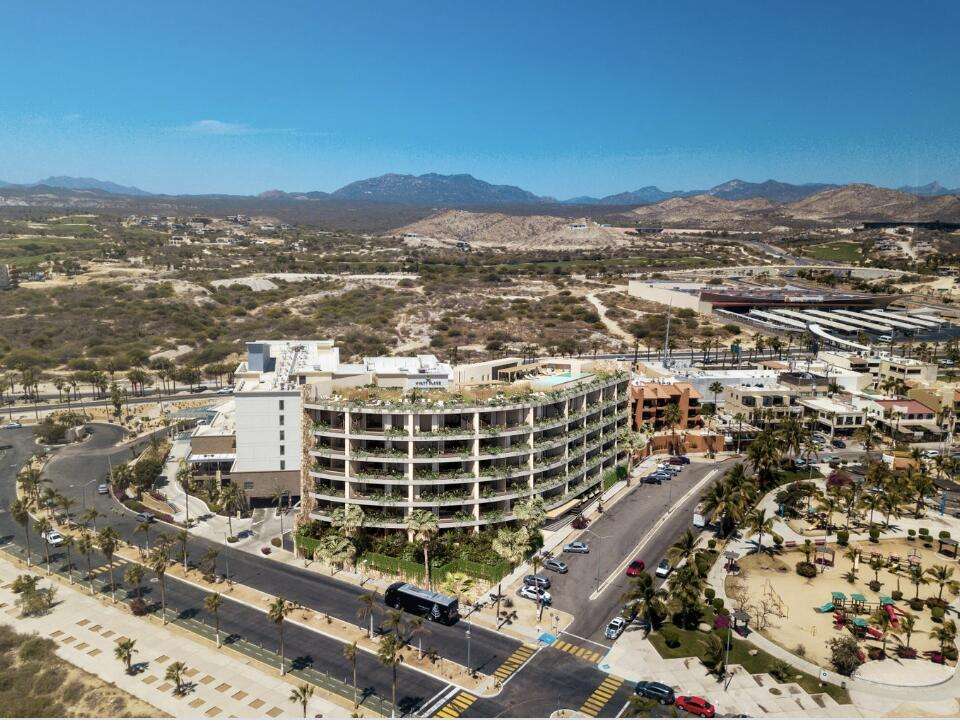 Los Cabos Dunna Welcome to Dunna - A New Standard of Luxury in Cabo. More than a residence, Dunna is a vibrant, fully integrated community where luxury, culture, and recreation converge. Designed by renowned architect Sordo Madaleno, this visionary development seamlessly blends timeless elegance with natural tranquility, offering meticulously crafted residences and garden villas complemented by world-class amenities. Elevated Living, Unmatched Experiences Choose from 13 thoughtfully designed floor plans from 2 - 5 bedrooms ranging from 1,475 - 6,458 sq. ft., featuring seamless indoor-outdoor living, elegant finishes, private rooftops, Jacuzzis, and lush garden terraces. Resort-Style AmenitiesEnjoy unparalleled amenities, including:" Infinity pools (Adults-only, Family, Kids & Oasis)" State-of-the-art wellness & fitness center" Luxury spa (sauna, steam, ice baths, massage suites)" Exclusive rooftop lounges & panoramic for sale