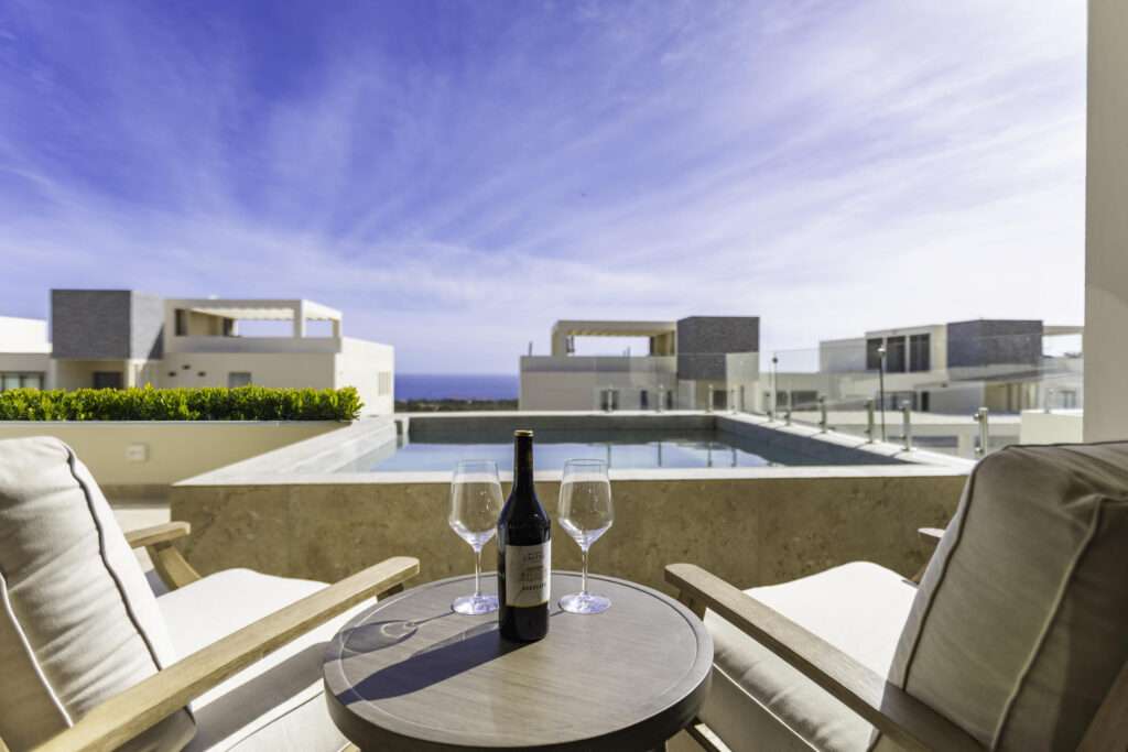 Los Cabos Cabo Costa Welcome to Cabo Costa, one of Cabo San Lucas' newest residential communities, where modern architecture meets the natural beauty of Baja. This beautifully appointed ground-floor residence features two spacious en-suite bedrooms, a private terrace, and a dipping pool. Finished in warm, neutral tones, the home offers a timeless design that is both elegant and inviting. Residents enjoy resort-style amenities including a clubhouse, infinity pool, fitness center, sundeck, and business space. Contact me today for more information or to schedule a private tour. – Via La Paloma, Cabo Corridor, BS