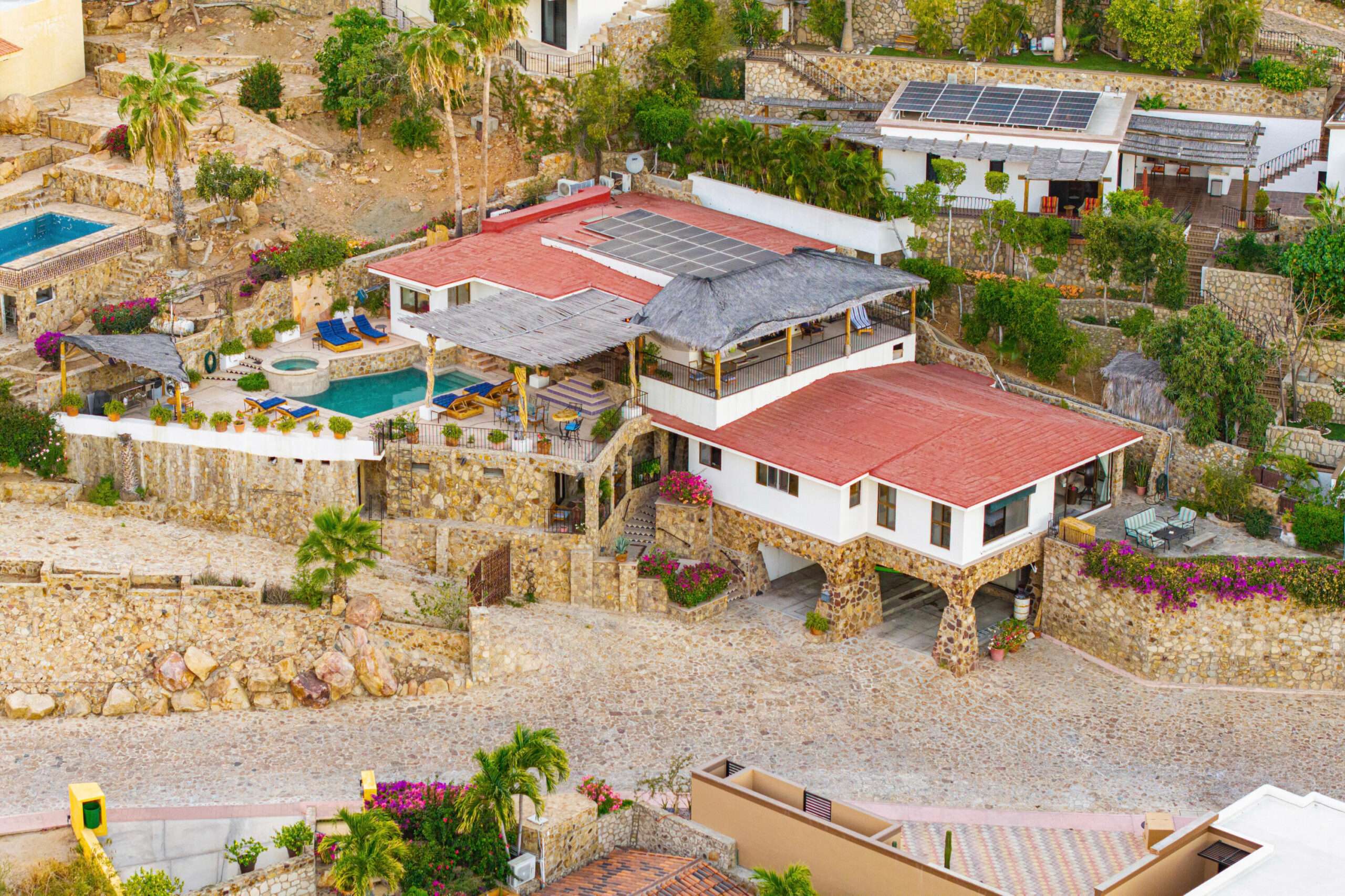 Los Cabos Pedregal Csl Villa Felicidad is a 5-bedroom, 5.5-bath residence in Pedregal that combines scale, location, and proven income potential. Set just minutes from the main gate and within walking distance to the marina, it offers effortless access to Cabo's best dining and nightlife while maintaining privacy. The home features a private pool, expansive terraces, and panoramic marina for sale